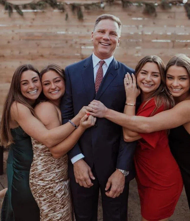 Skyla Brae Kelley with her sisters and father
